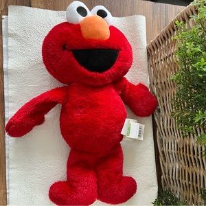 Sesame Street red Elmo pillow Buddy.